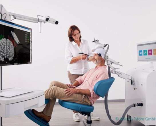 Doctor Doing TMS Therapy