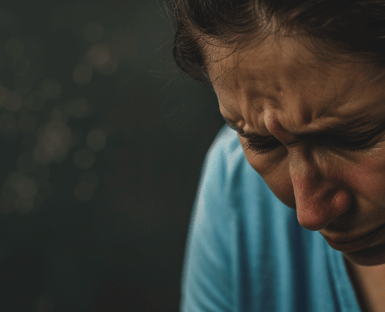 Woman Crying, Learning about treatment options for treatment-resistant depression at American TMS Clinics. Discover new hope and treatments for those who haven’t found relief from usual therapies.